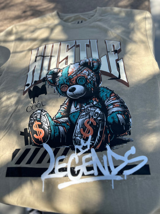 T-shirt with a graphic of a teddy bear and text on a light background